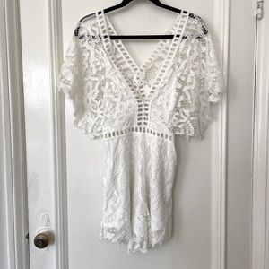 Lace romper in white by Lioness